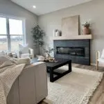 Cozy neutral living room with fireplace
