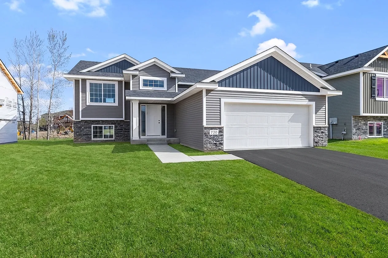 Gray suburban house with two-car garage