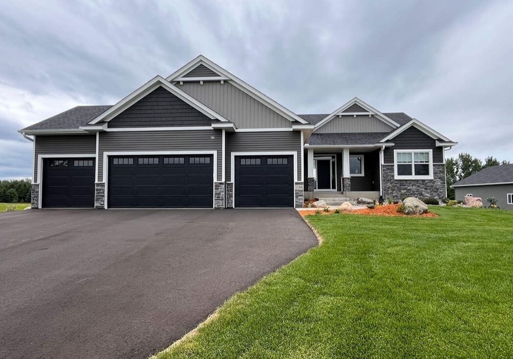 Modern gray house with three-car garage